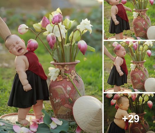 Innocent Charms: The Captivating Fusion of Baby’s Emotions and Delicate Lotus Flowers