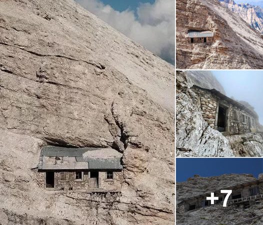 The Isolated Marvel: A Century-Old Dwelling Perched on a Secluded Mountain Ridge in the Italian Dolomites