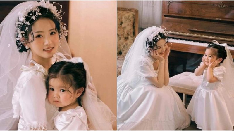 Timeless Love Captured: Mother and Daughter Elegantly Embrace Tradition in Wedding Attire