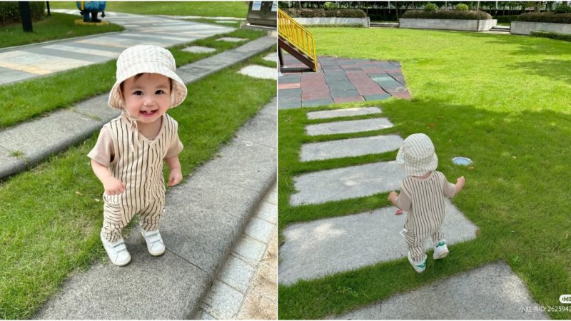 Playful Bliss: Adorable Baby’s Grassy Shenanigans Take the Internet by Storm